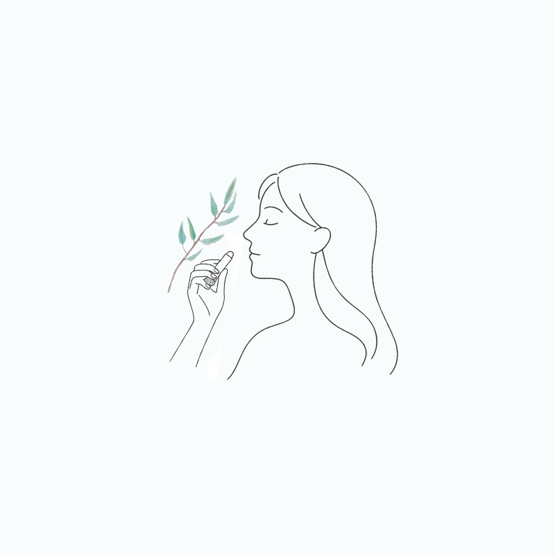 アロマインヘーラーの花粉症対策の香りを使っている女性のイメージ図